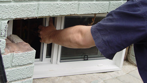 Installing new windows in a Bainbridge Island finished basement