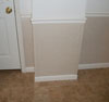 A closeup of our completed drywall repair system.  On the floor are our warrantied ThermalDry® parquet floor tiles.
