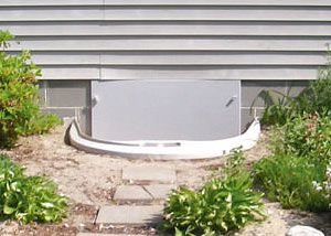 Rigid plastic crawl space access well installed in a Silverdale crawl space