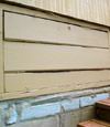 an old-fashioned crawl space door in Olalla about to be replaced