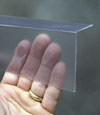 Closeup of a clear plastic covering on a Belfair crawl space block wall