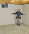 Aberdeen basement insulation covered by EverLast™ wall paneling, with SilverGlo™ insulation underneath