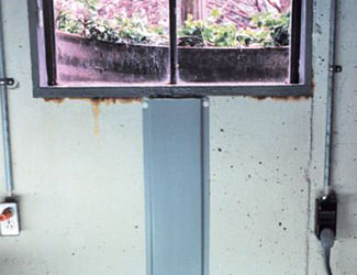 Repaired waterproofed basement window leak in Port Angeles